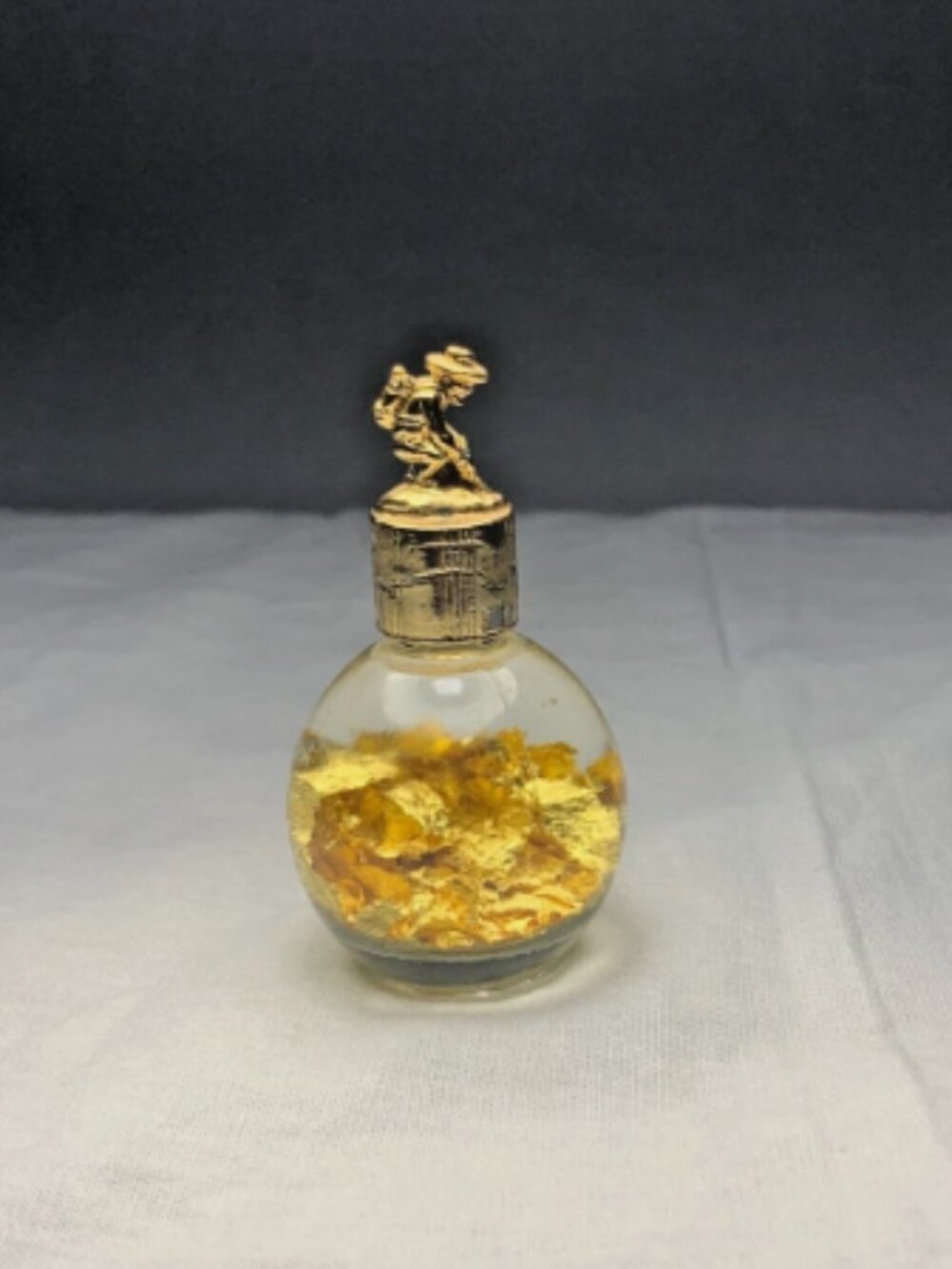 2 1/4" Vintage Souvenir Bottle 24 Karat Floating Gold Flakes Miner On The Cap